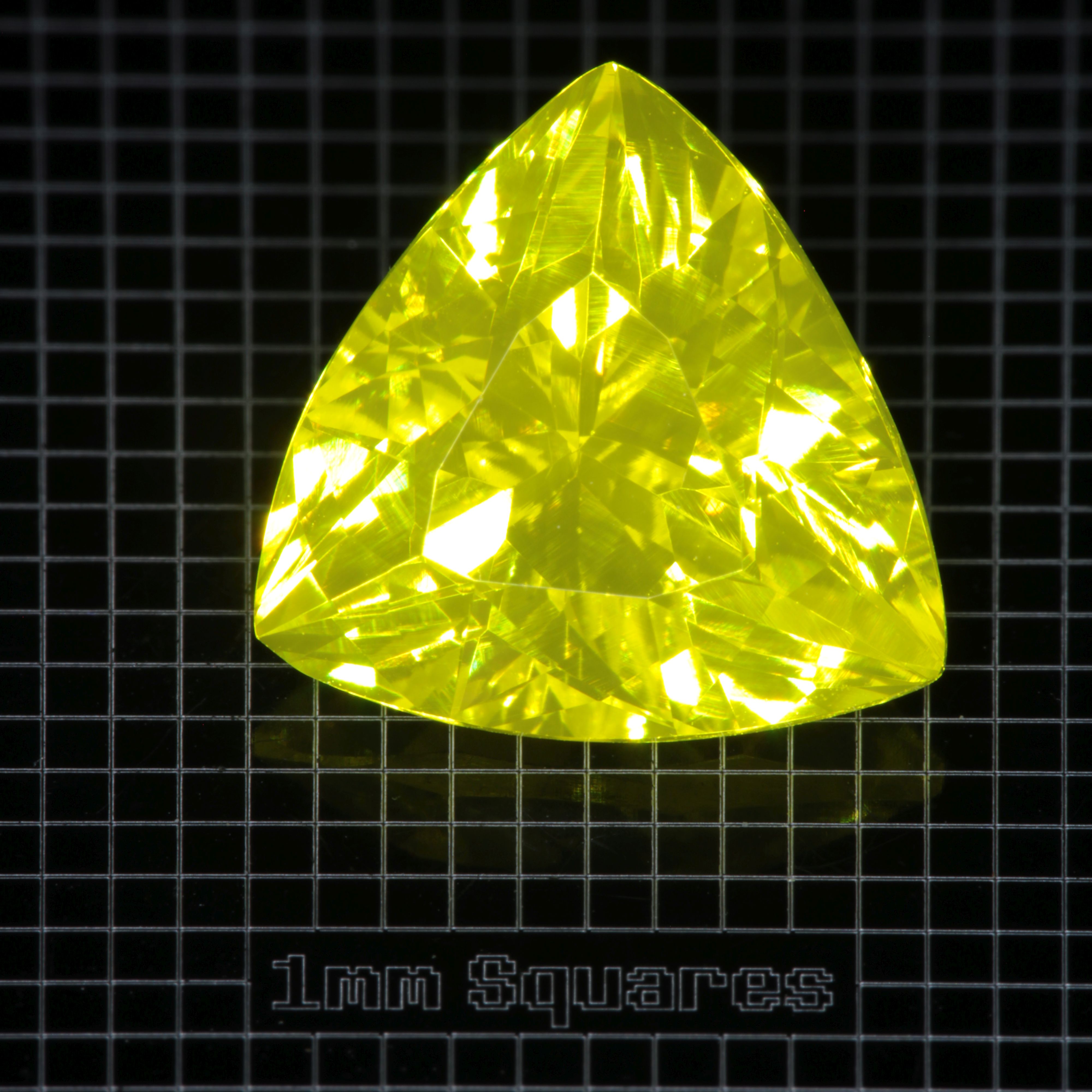 Faceted GAGG Trillion gemstone