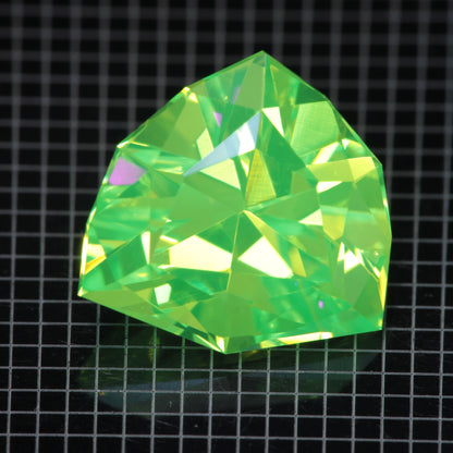 Faceted LuAG, Spiral Trillion Lutetium Aluminum Garnet Gemstone