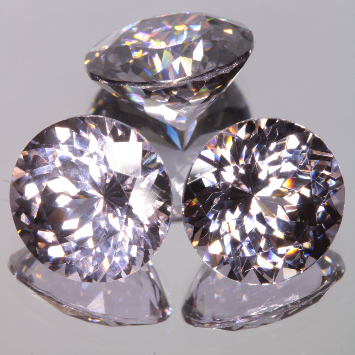 Faceted 9mm Round YAG:Nd:Ce Gemstone