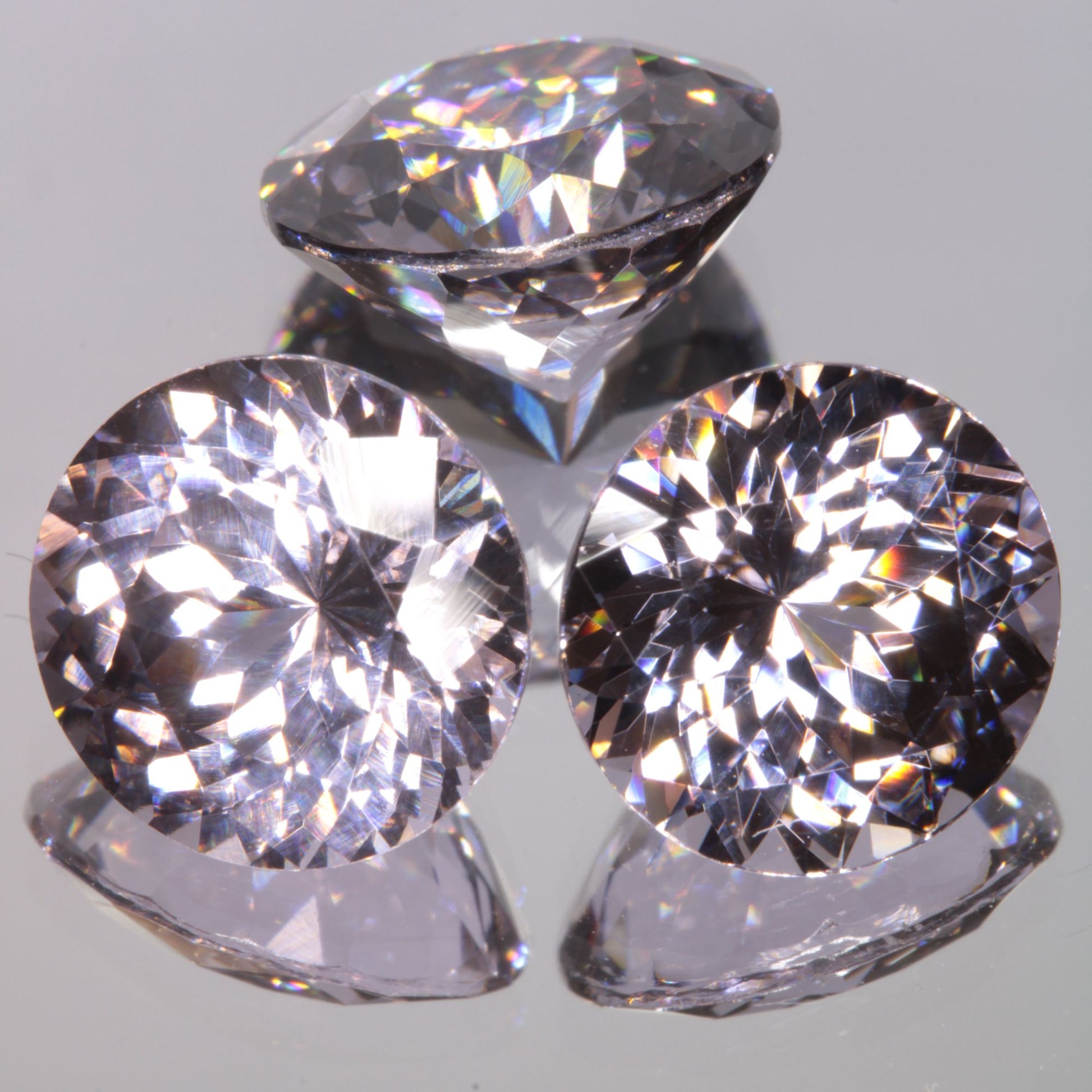 Faceted 9mm Round YAG:Nd:Ce Gemstone