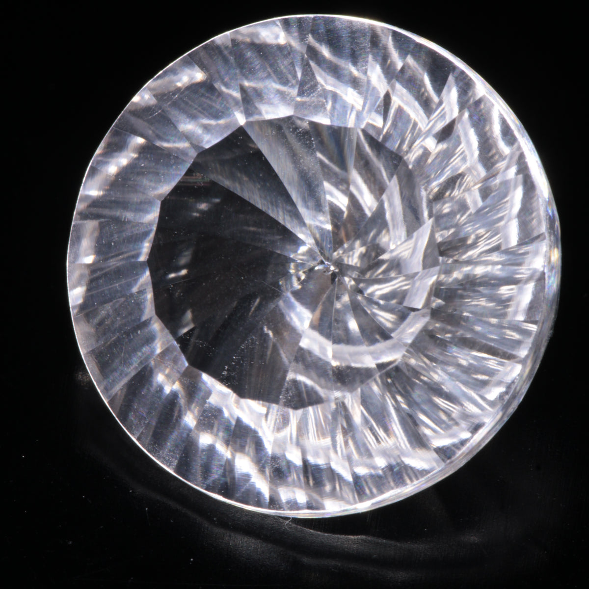 Faceted Colorless White Sapphire Shallow Spiral Round Fantasy Cut Gem