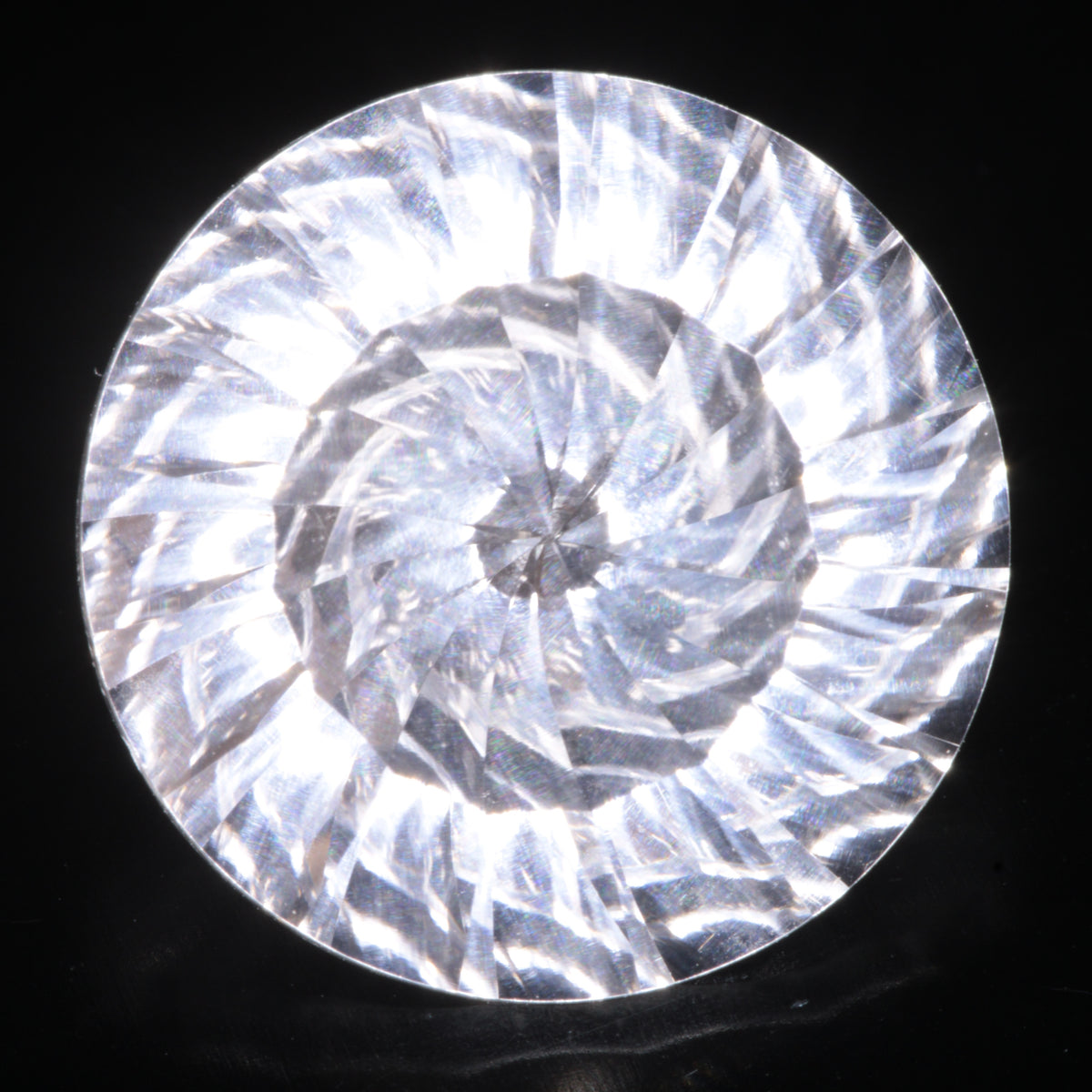 Faceted Colorless White Sapphire Shallow Spiral Round Fantasy Cut Gem