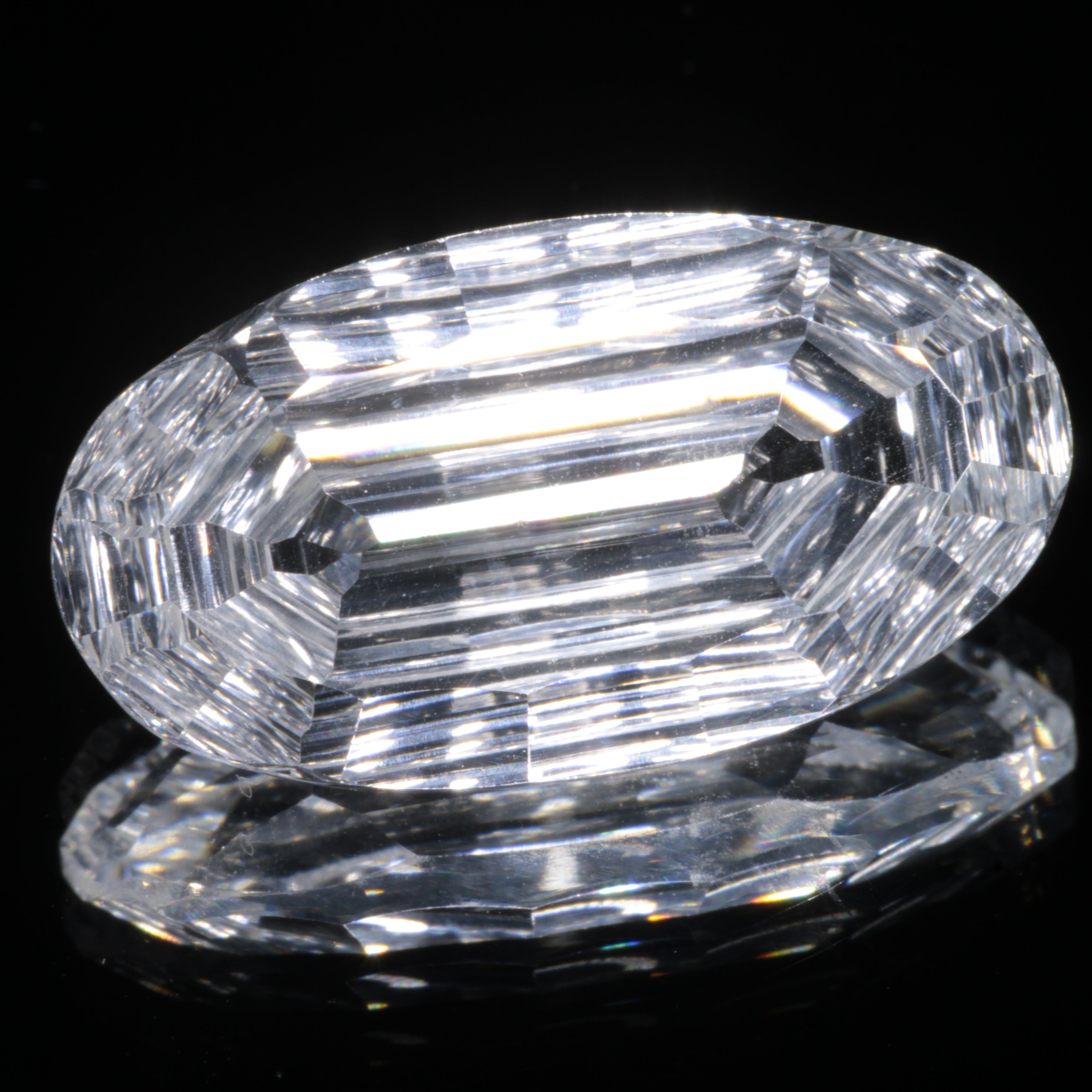 Faceted Colorless White Sapphire Rippled Oval Fantasy Cut Gem
