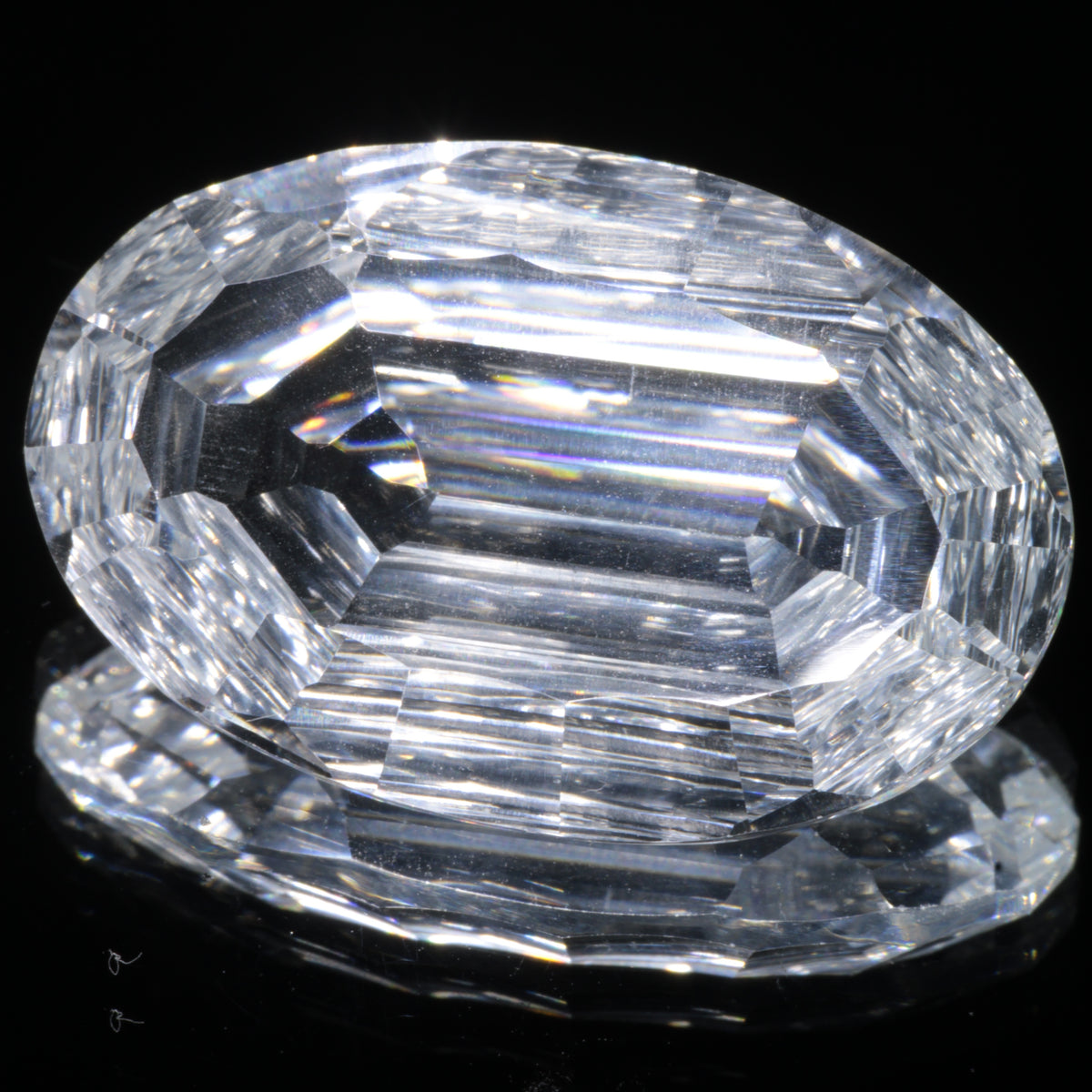 Faceted Colorless White Sapphire Rippled Oval Fantasy Cut Gem