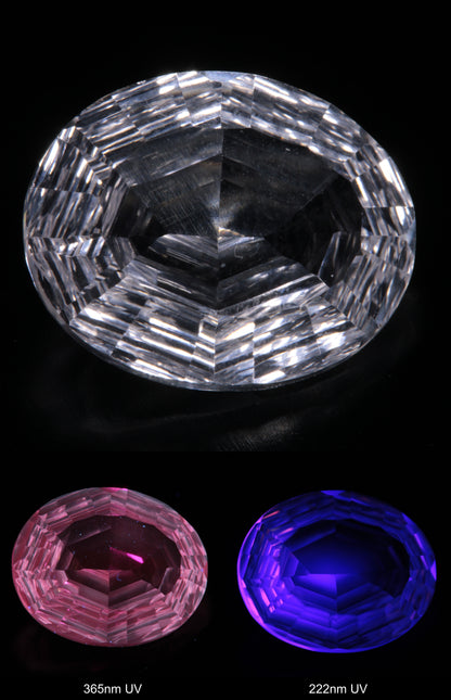Faceted Colorless White Sapphire Rippled Oval Fantasy Cut Gem Shown Under Multiple UV Lights
