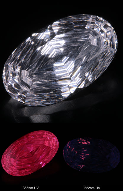 Faceted Colorless White Sapphire Rippled Oval Fantasy Cut Gem Shown Under Multiple UV Lights