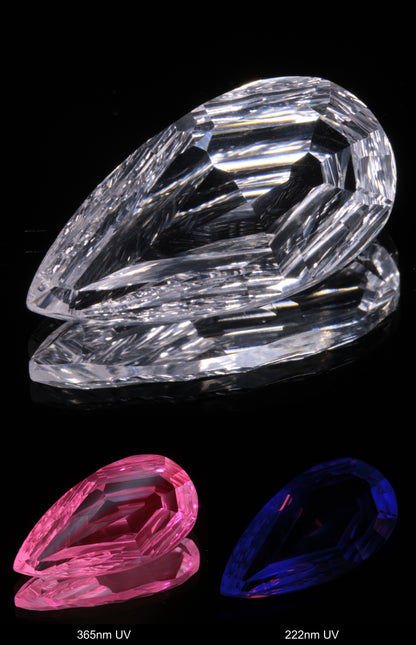 Faceted Colorless White Sapphire Rippled Teardrop Fantasy Cut Gem Shown Under Multiple UV Lights