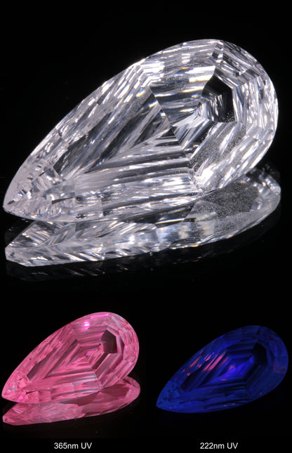 Faceted Colorless White Sapphire Rippled Teardrop Fantasy Cut Gem Shown Under Multiple UV Lights