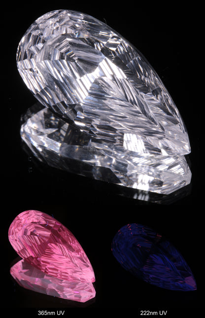 Faceted Colorless White Sapphire Partially Rippled Teardrop Fantasy Cut Gem Shown Under Multiple UV Lights