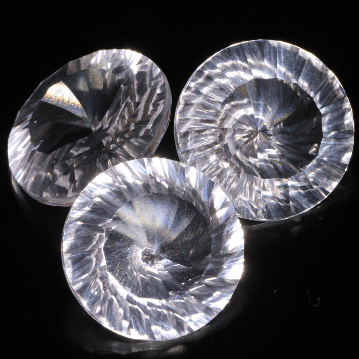 Faceted Colorless White Sapphire Shallow Spiral Round Fantasy Cut Gem