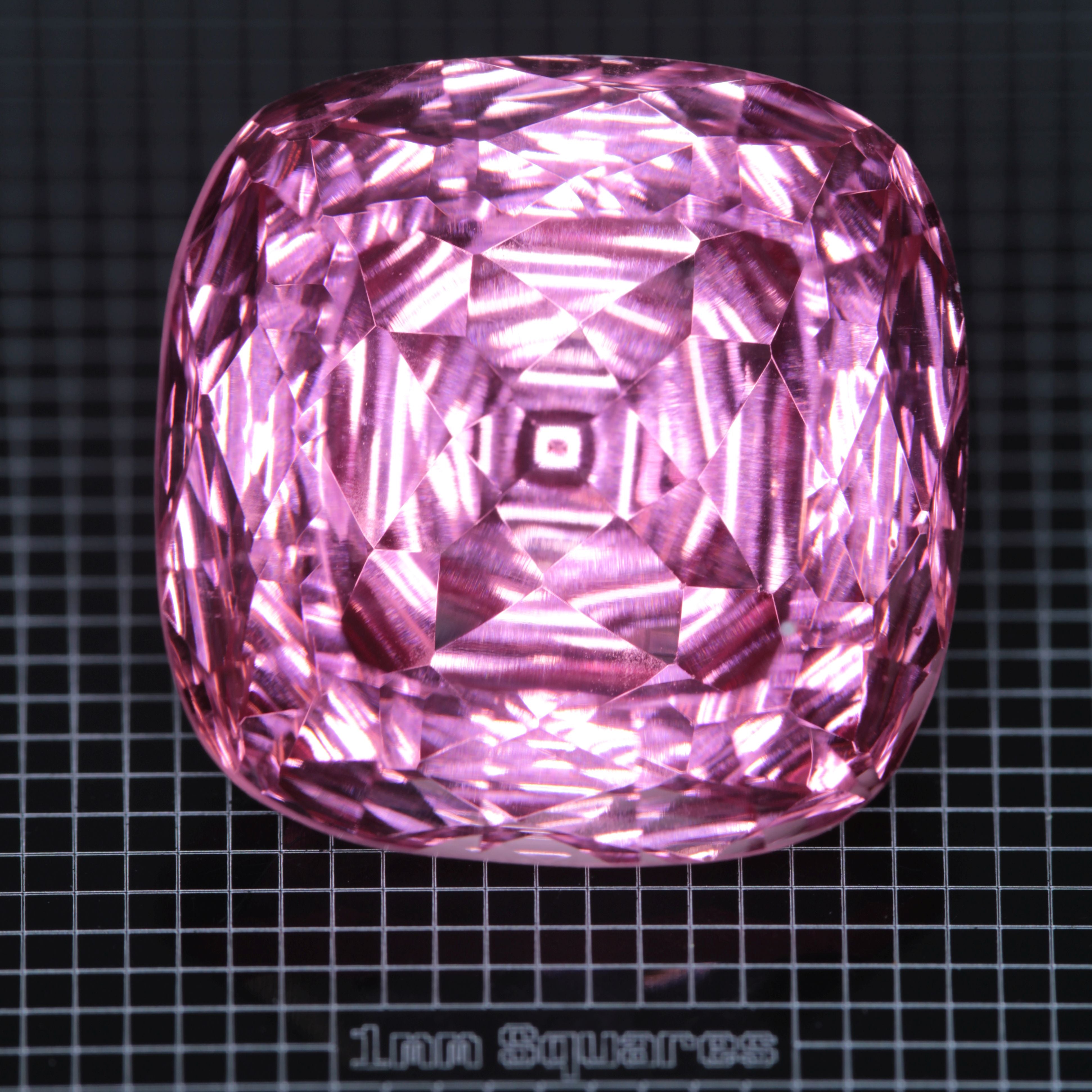 Faceted Strawberry Titanium Sapphire Cushion gemstone