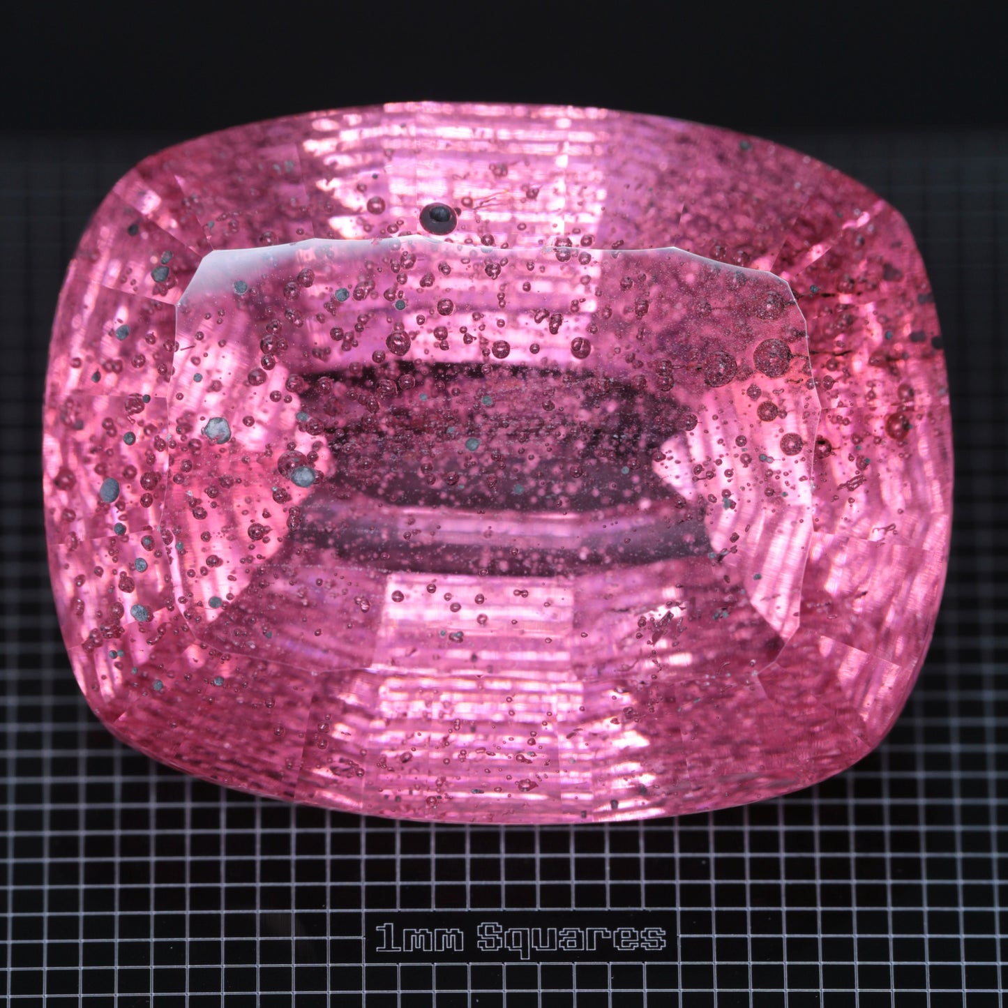 Faceted Strawberry Titanium Sapphire Oval Cushion gemstone