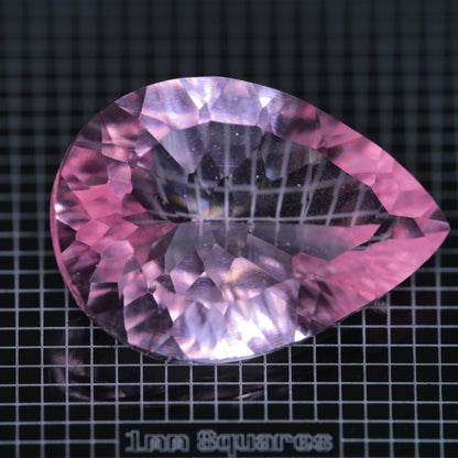 Faceted Strawberry Titanium Sapphire Pear gemstone