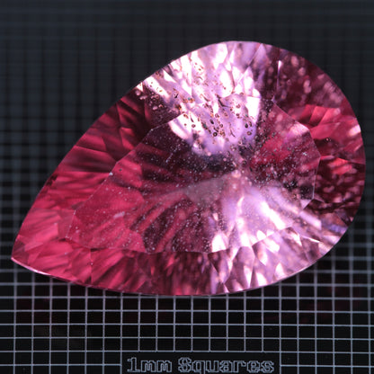 Faceted Strawberry Titanium Sapphire Pear gemstone