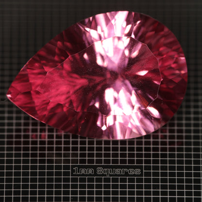 Faceted Strawberry Titanium Sapphire Pear gemstone