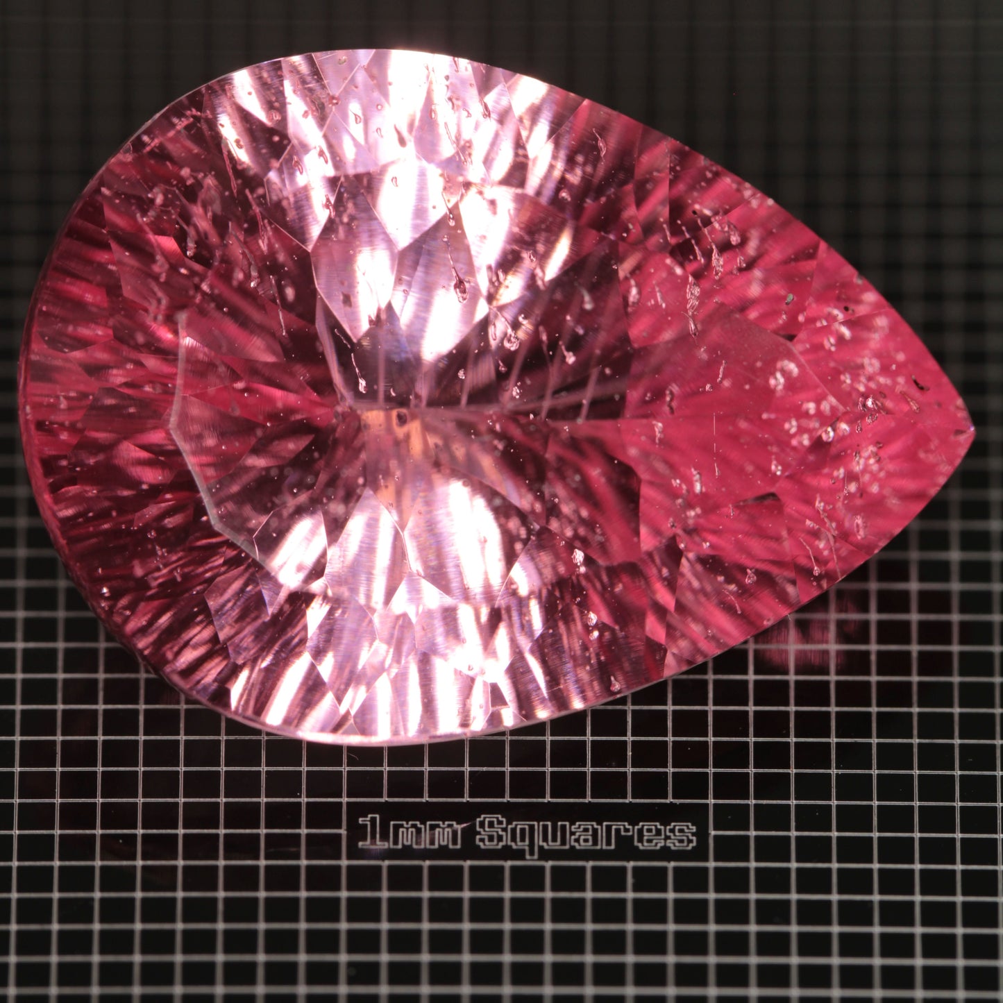 Faceted Strawberry Titanium Sapphire Pear gemstone
