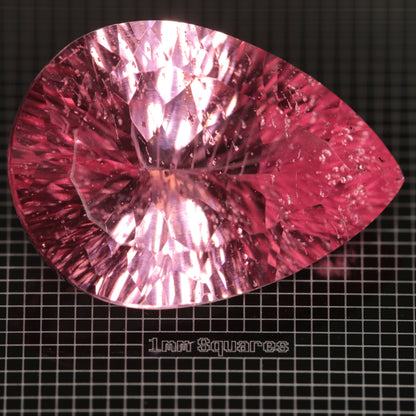 Faceted Strawberry Titanium Sapphire Pear gemstone