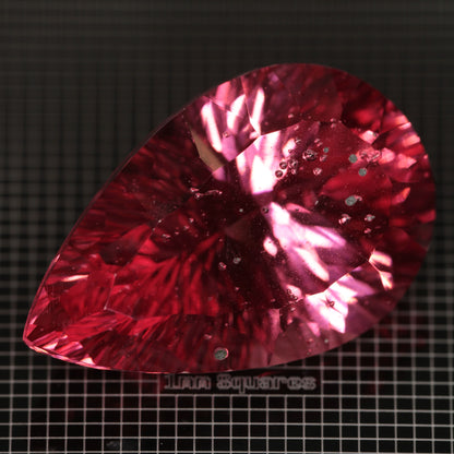 Faceted Strawberry Titanium Sapphire Pear gemstone