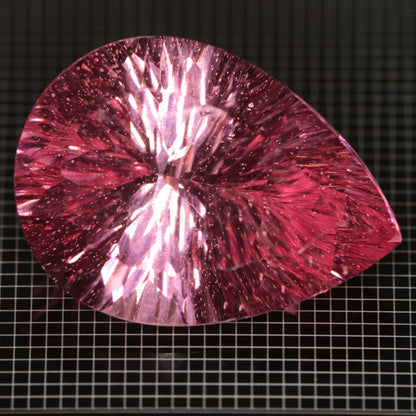 Faceted Strawberry Titanium Sapphire Pear gemstone
