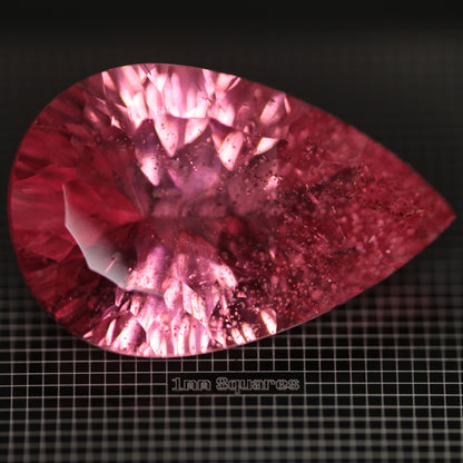 Faceted Strawberry Titanium Sapphire Pear gemstone