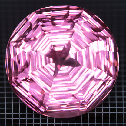 Faceted Strawberry Titanium Sapphire Round gemstone