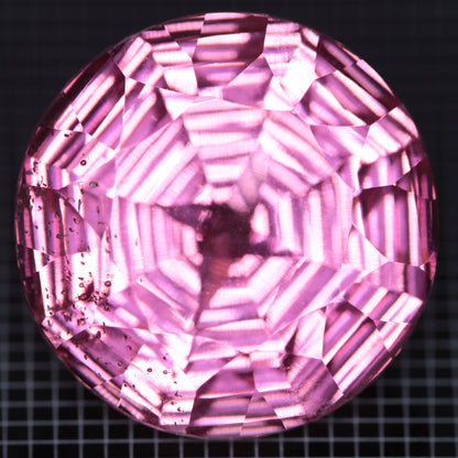 Faceted Strawberry Titanium Sapphire Round gemstone