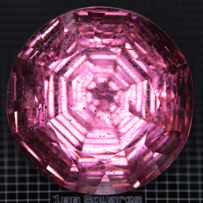 Faceted Strawberry Titanium Sapphire Round gemstone