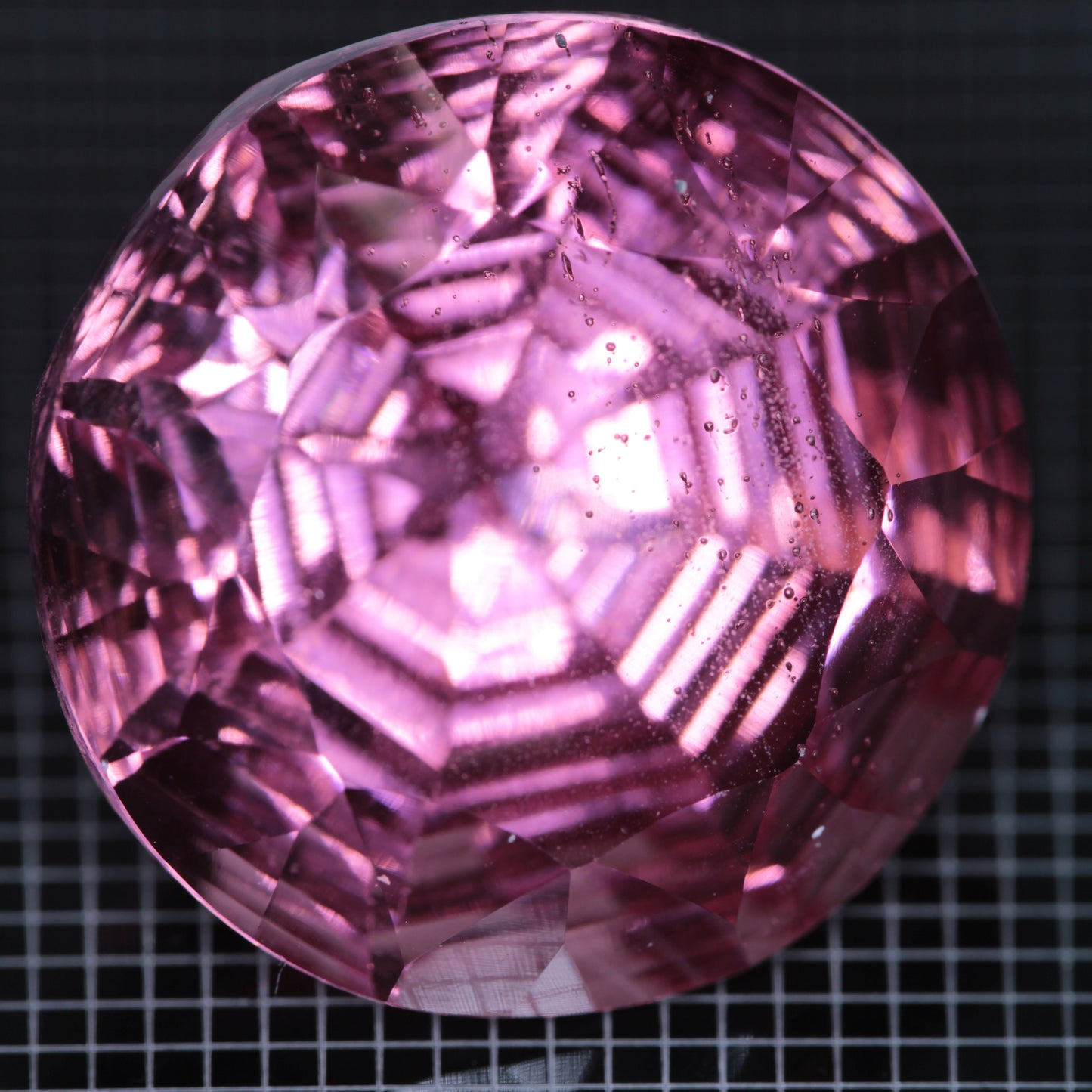 Faceted Strawberry Titanium Sapphire Round gemstone