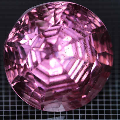 Faceted Strawberry Titanium Sapphire Round gemstone