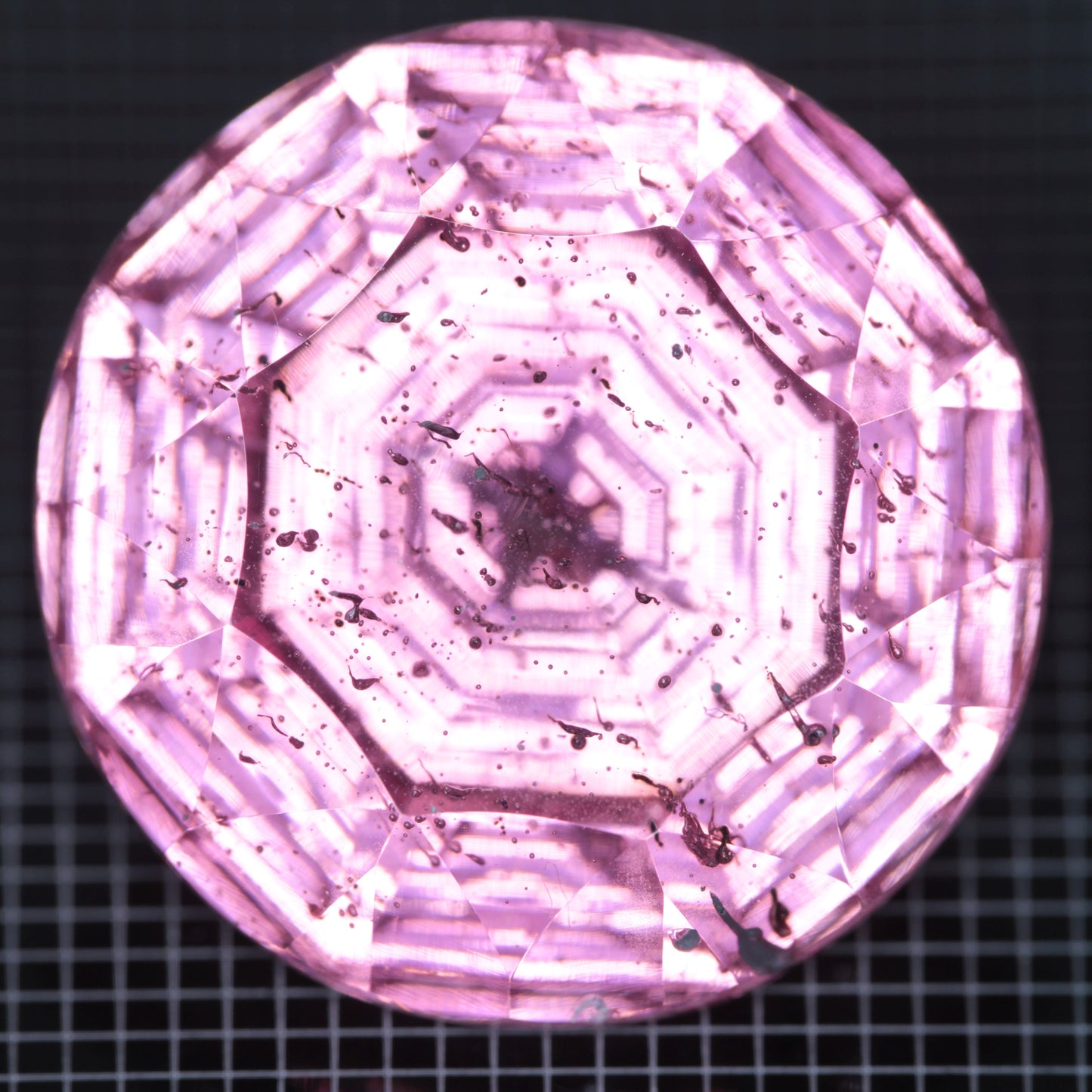 Faceted Strawberry Titanium Sapphire Round gemstone