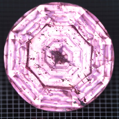 Faceted Strawberry Titanium Sapphire Round gemstone