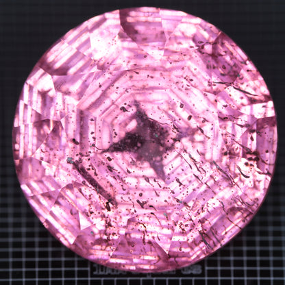 Faceted Strawberry Titanium Sapphire Round gemstone
