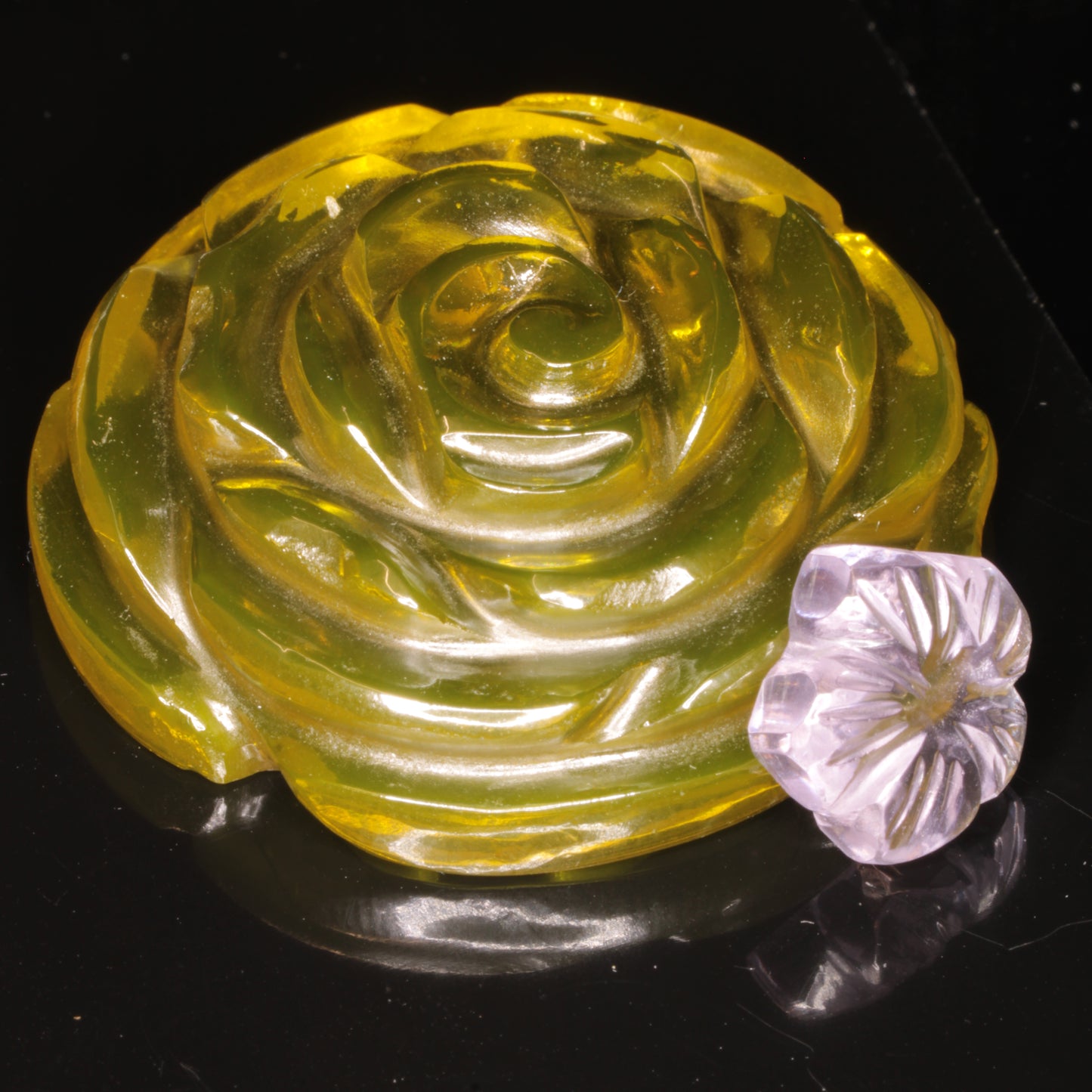 Two flowers carved from Laser YAG (doped with cerium and neodymium)