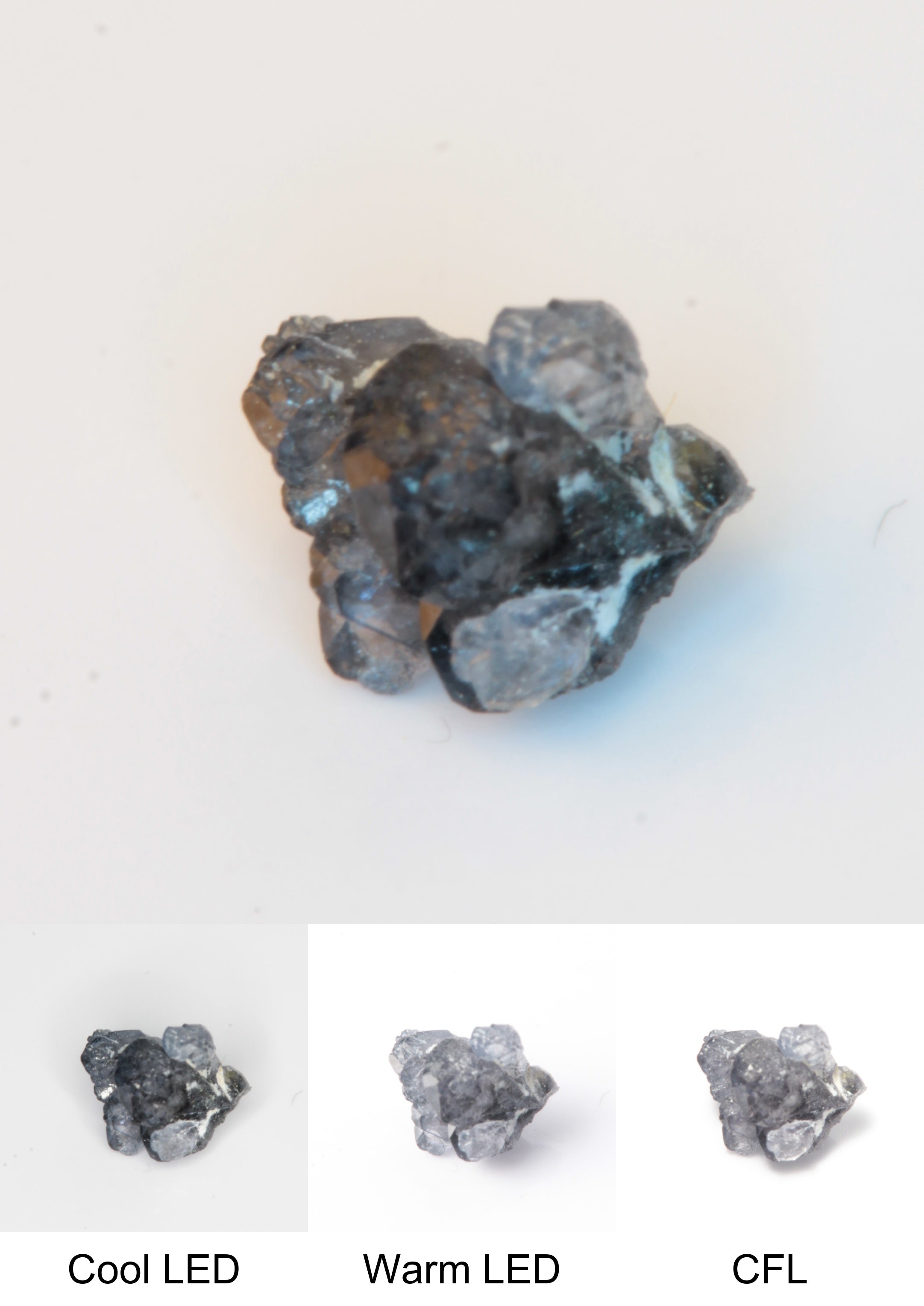 Synthetic Flux Playbutton Sapphire Gemstone Grown by Gems of Science on a white background showing color shift under different lighting