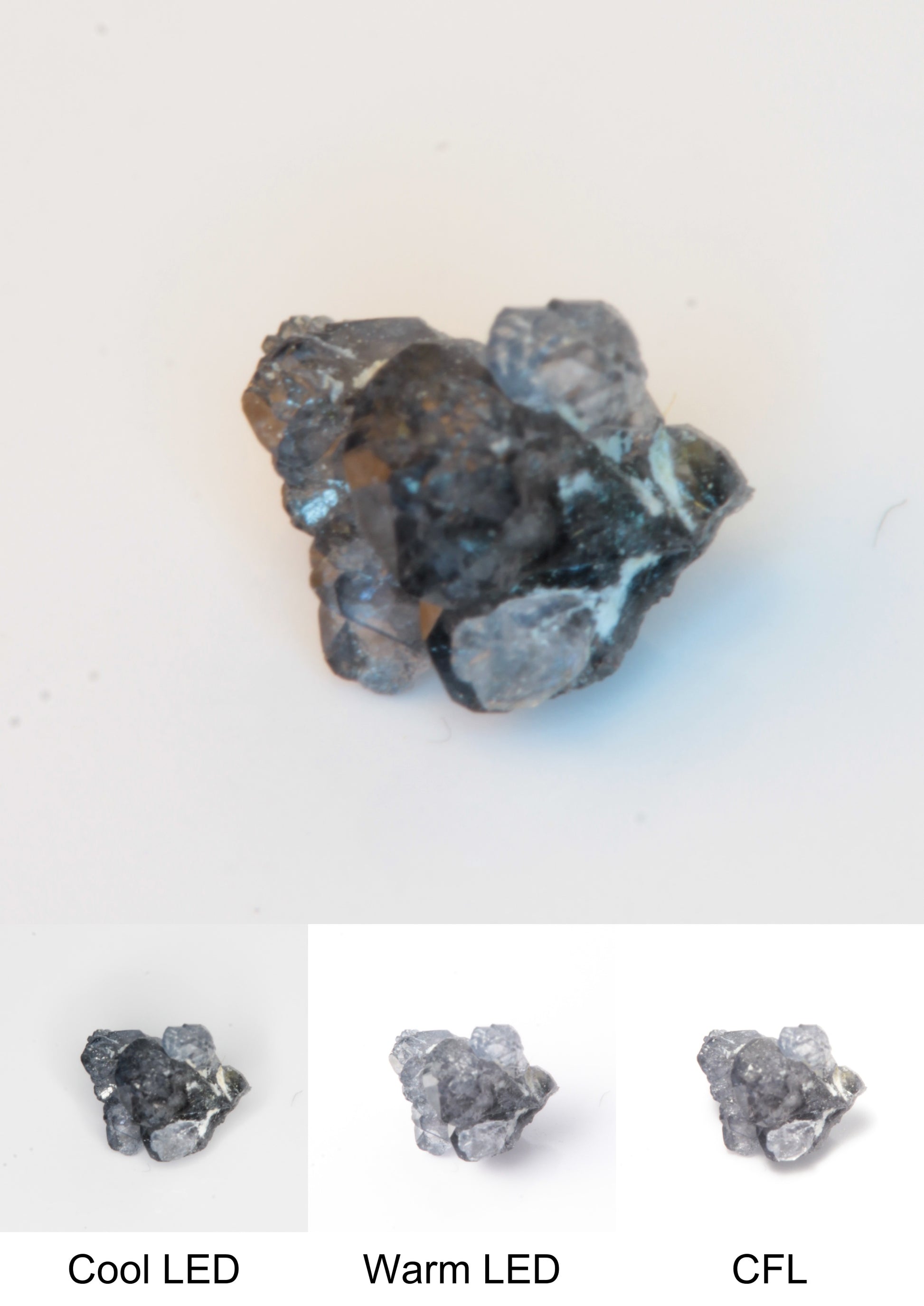 Synthetic Flux Playbutton Sapphire Gemstone Grown by Gems of Science on a white background showing color shift under different lighting