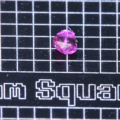 A small pink flux-grown ruby a few mm in size