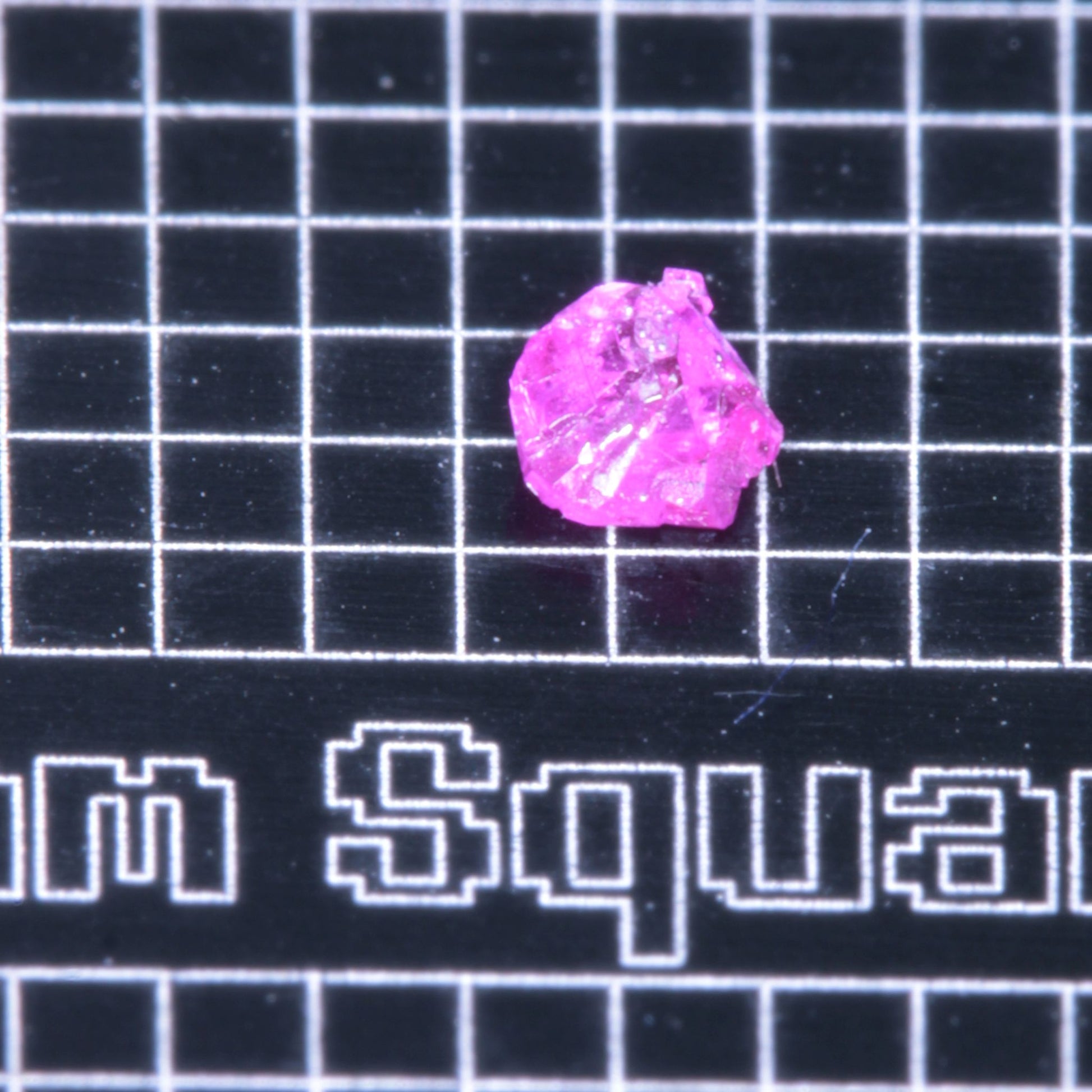 A small pink flux-grown ruby a few mm in size