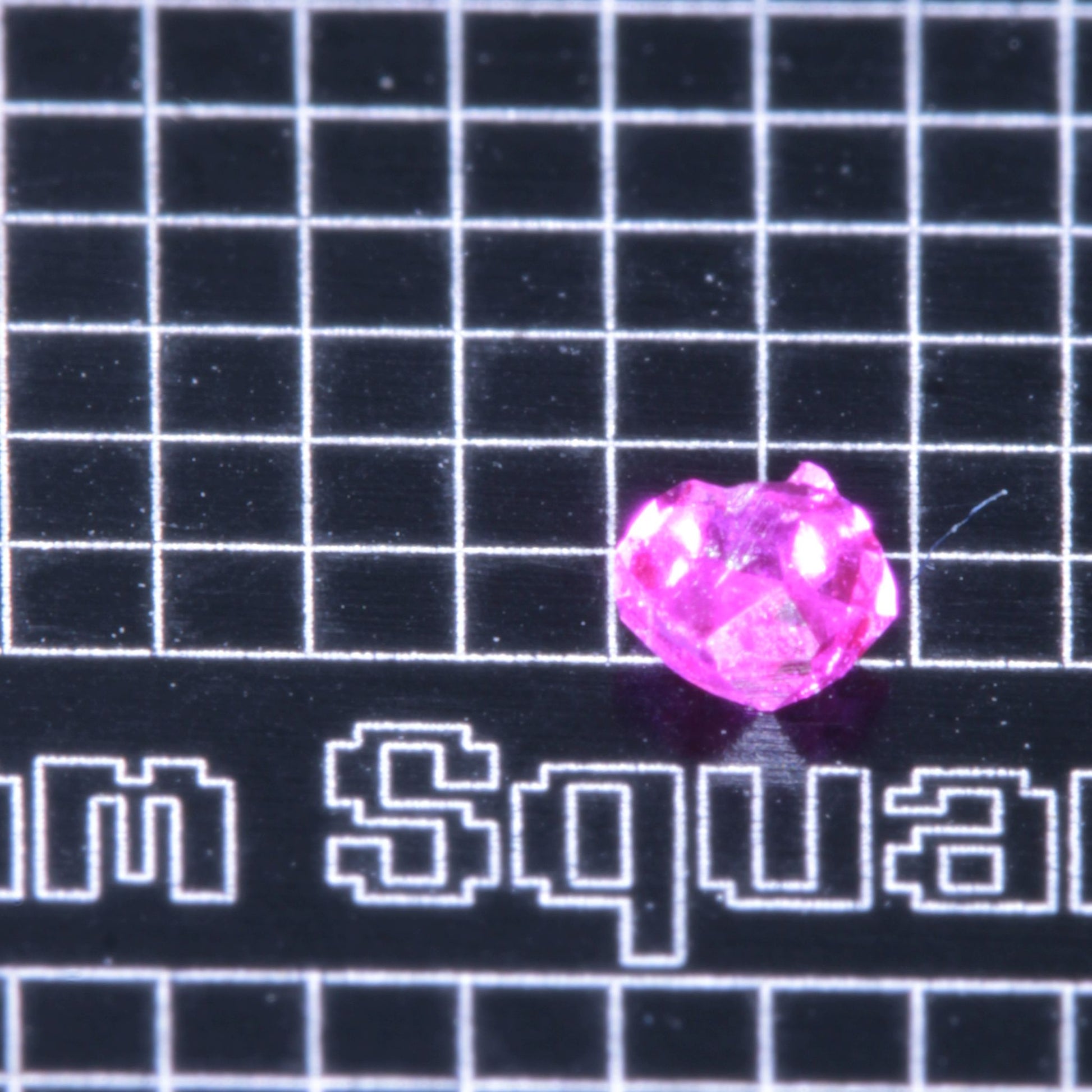 A small pink flux-grown ruby a few mm in size