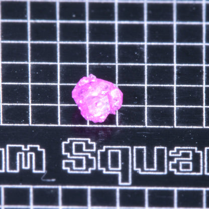 A small pink flux-grown ruby a few mm in size