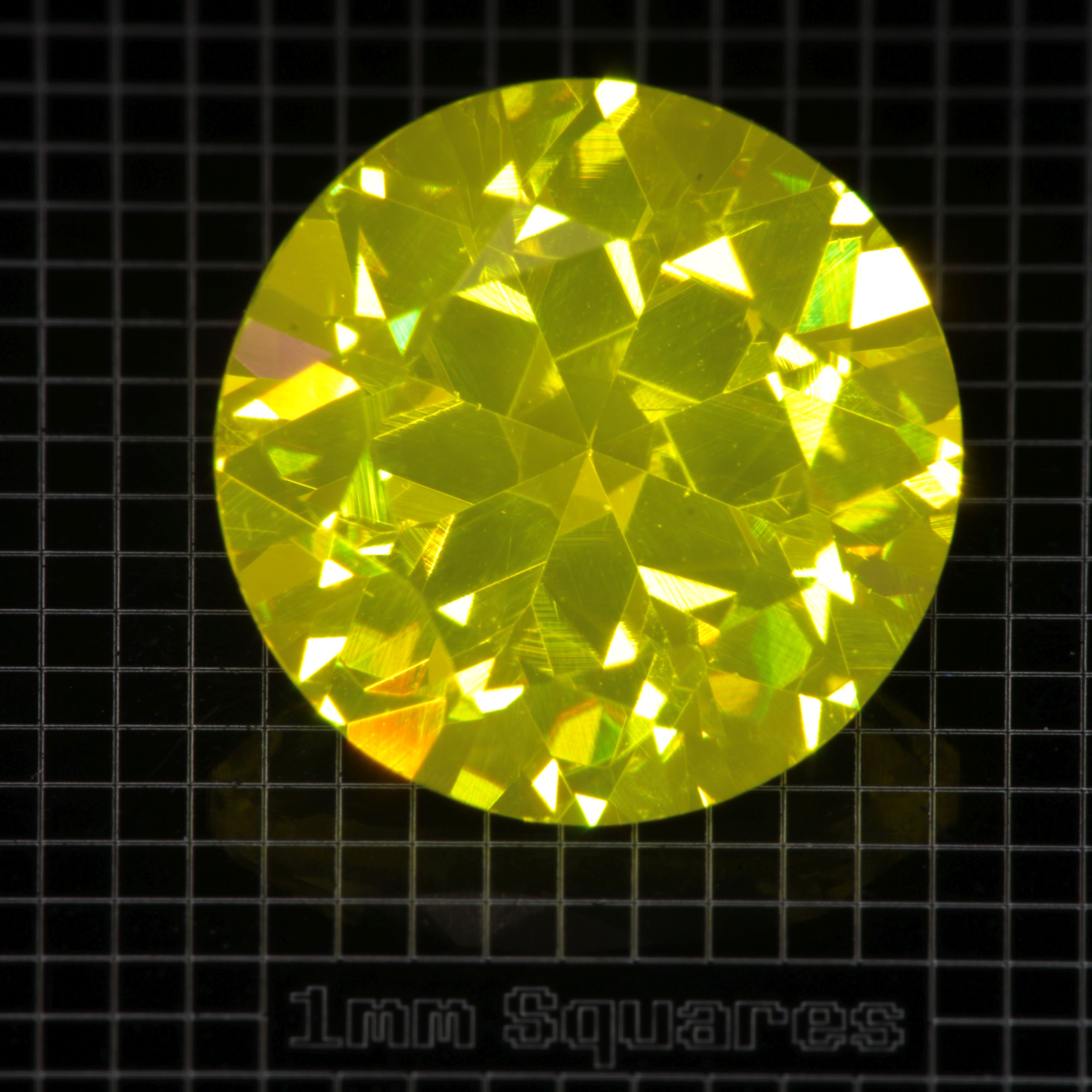 Faceted GAGG:Ce Round gemstone