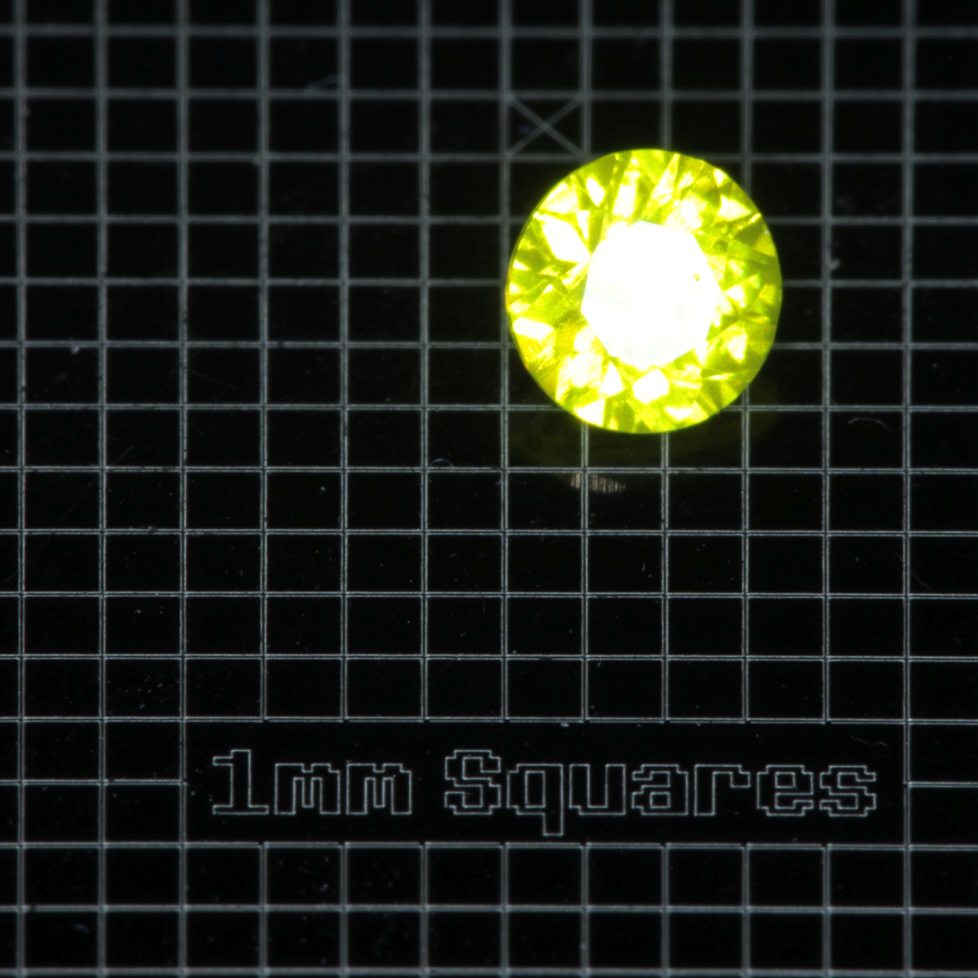 Faceted GAGG:Ce Round gemstone