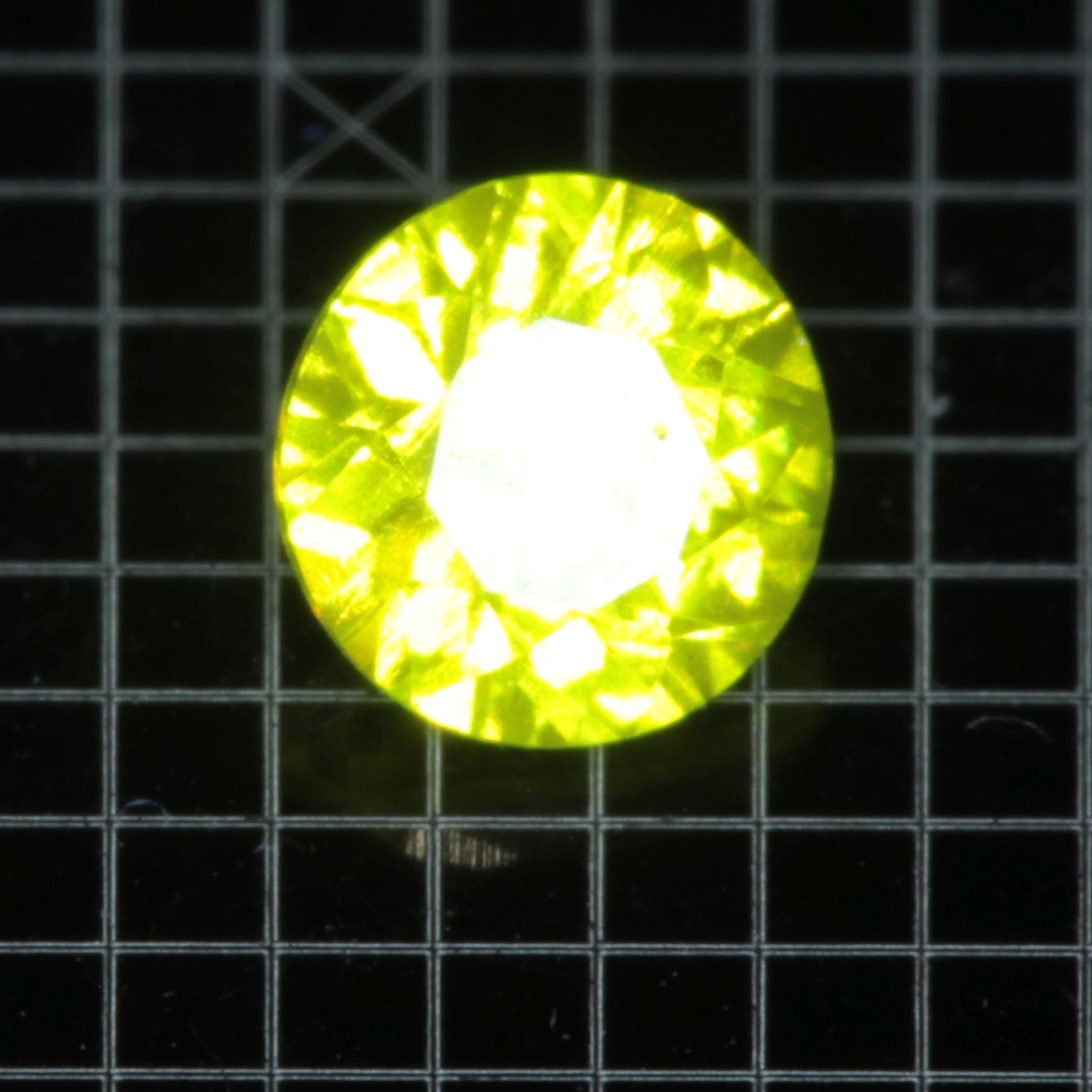 Faceted GAGG:Ce Round gemstone