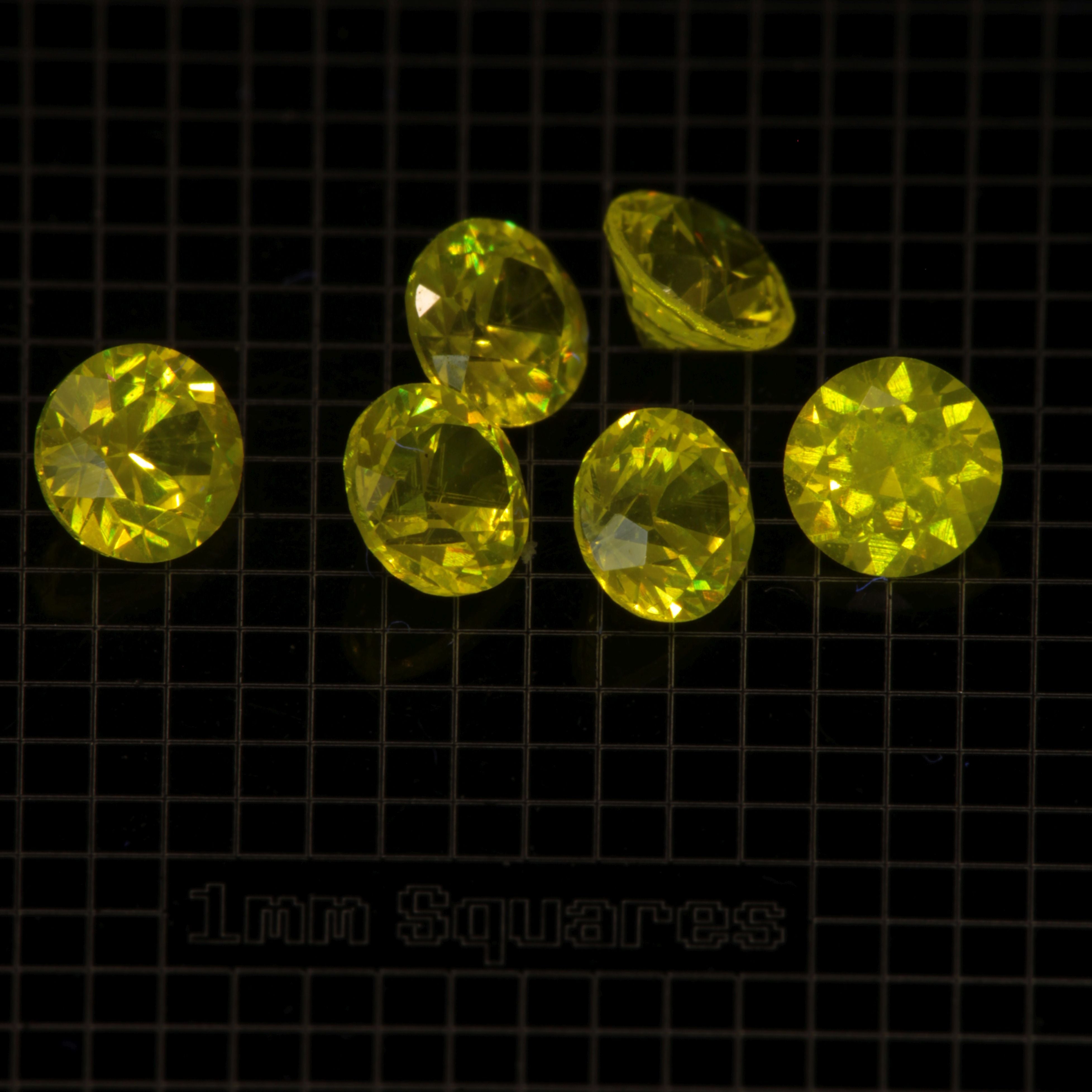 Faceted GAGG:Ce Round gemstone