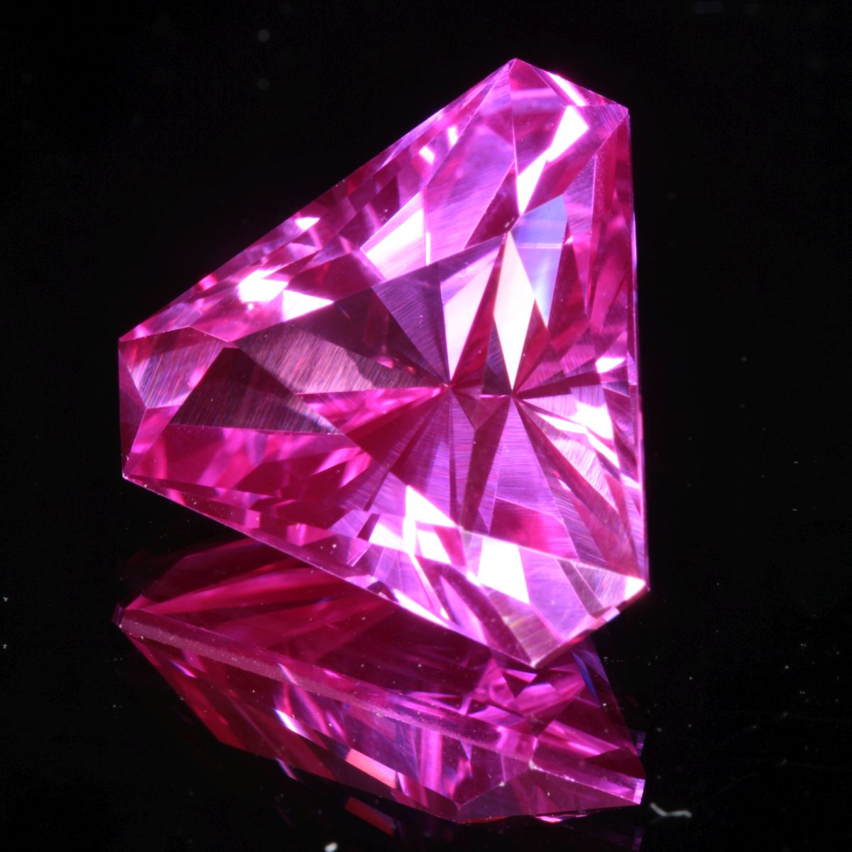 faceted Pink Trillion Ruby stone