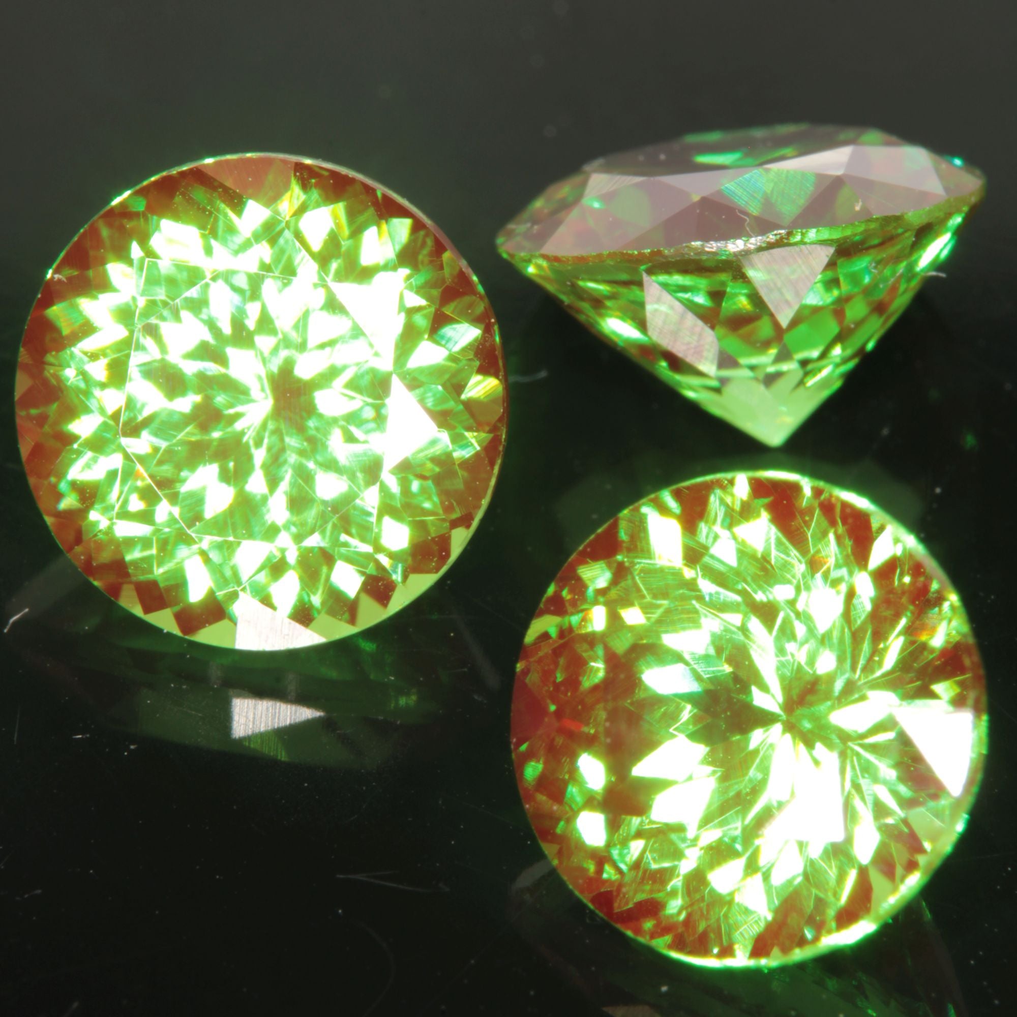 Round Cut Green and Red “Space Laser” YAG gem