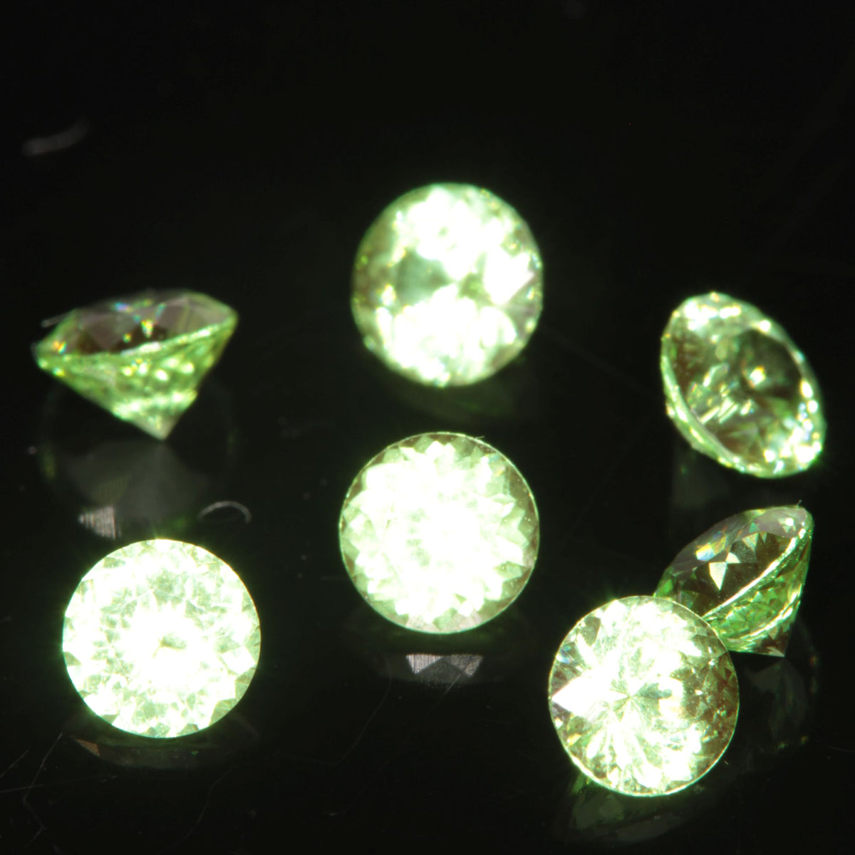 Round Cut Green and Red “Space Laser” YAG gem