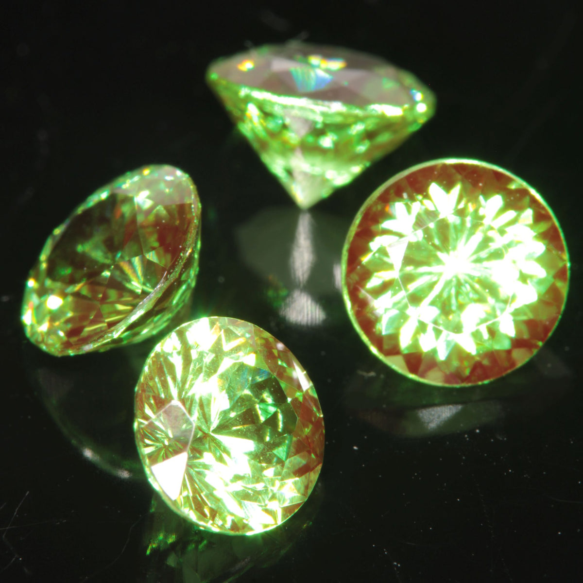 Round Cut Green and Red “Space Laser” YAG gem