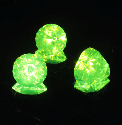 Green glowing LuAG lumogarnet gemstones