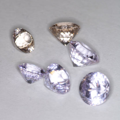 Pink Laser Garnet, Nd+ YAG in Violet, Pink and Peach