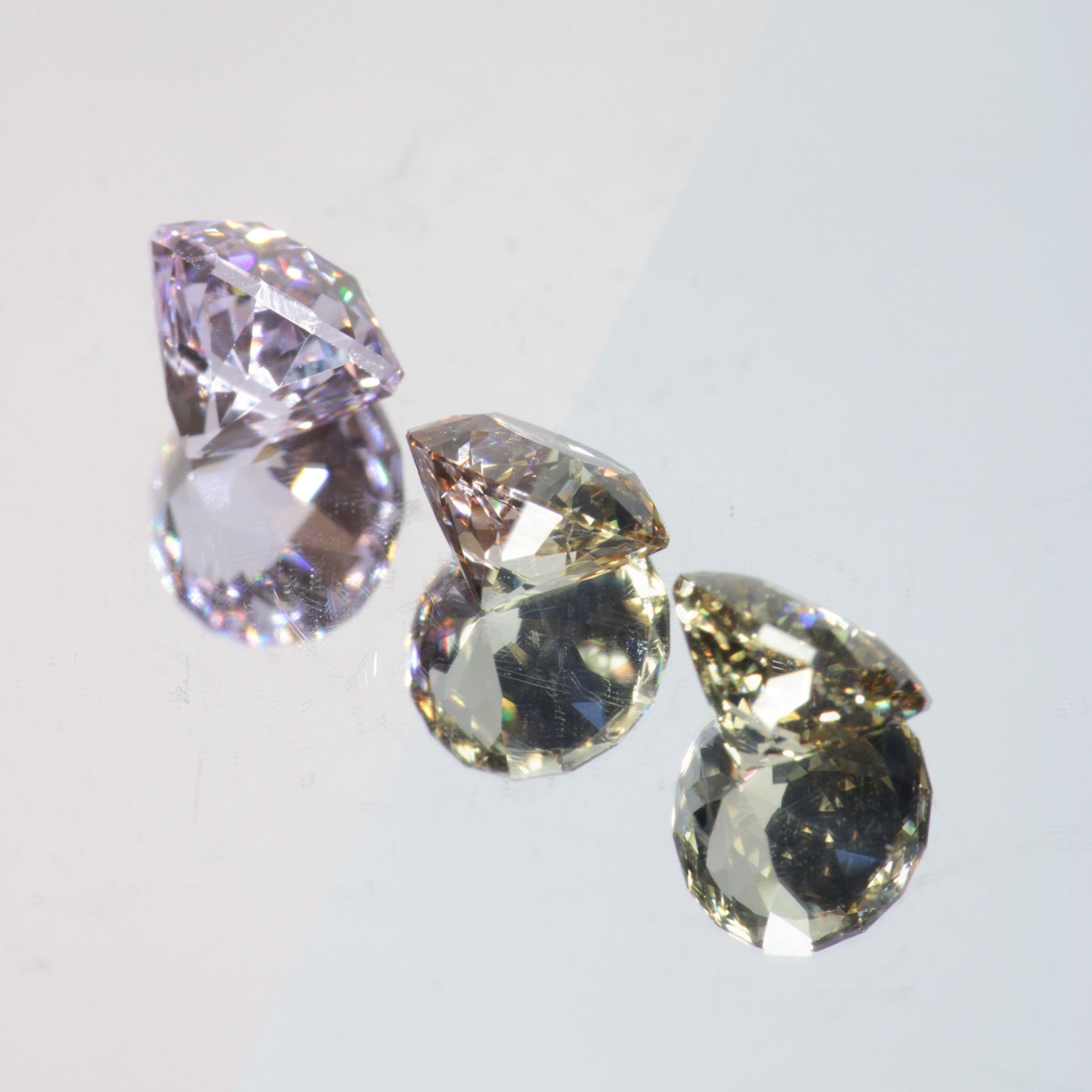 Pink Laser Garnet, Nd+ YAG in Violet, Pink and Peach